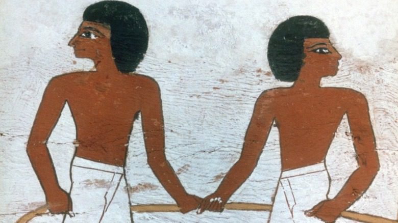 Два древнеегипетских мужчины за работой